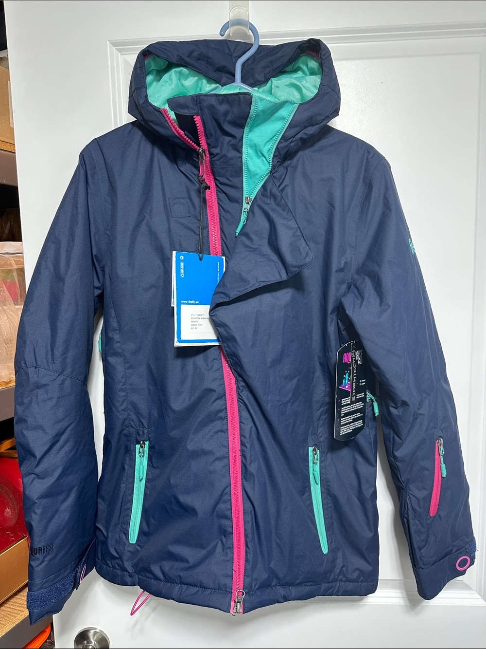Women Navy Ski Jacket with Teal Lining and Pink Accents